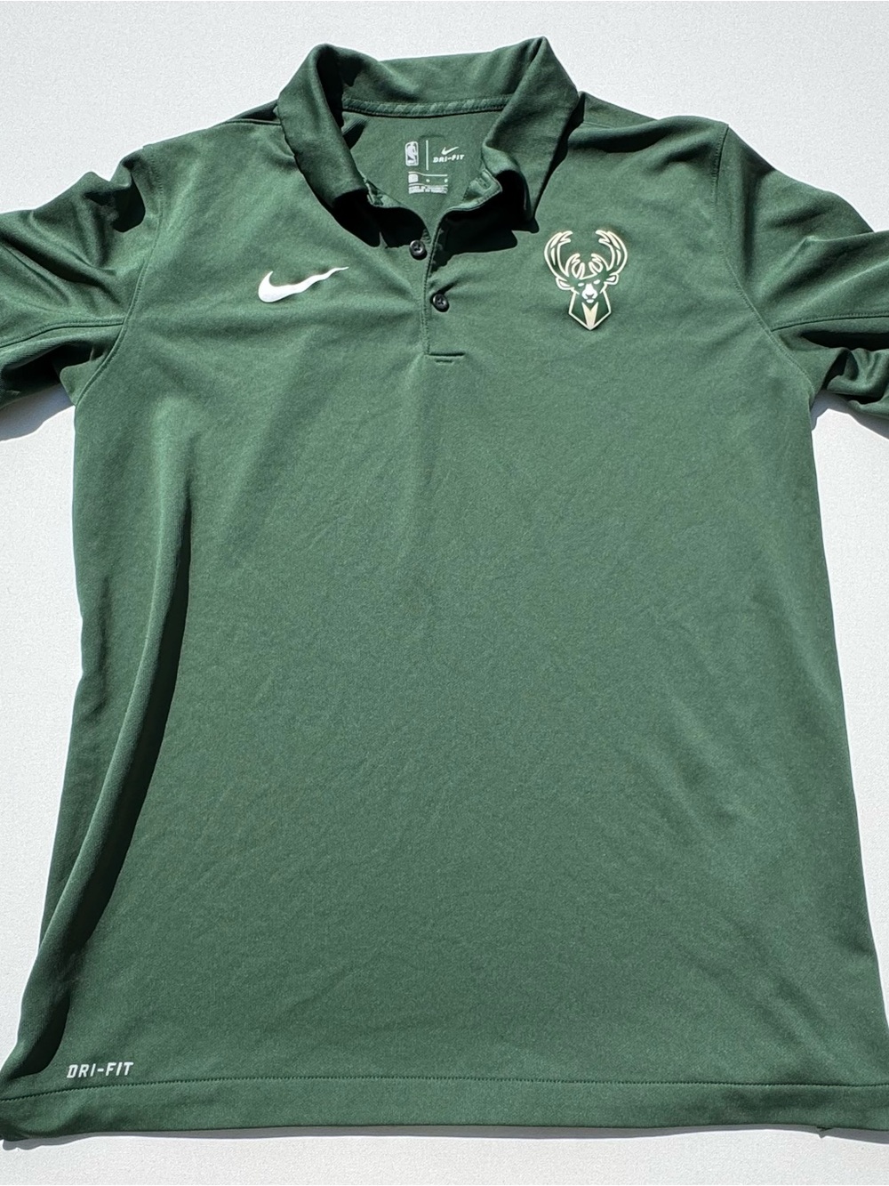 Nike Men’s Milwaukee Bucks Forest Green Dri-FIT Polo with White Logos